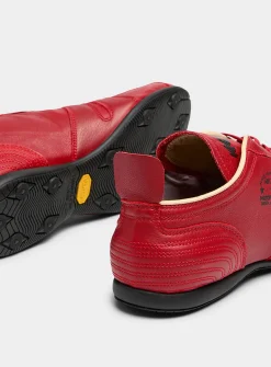 545 red sneakers