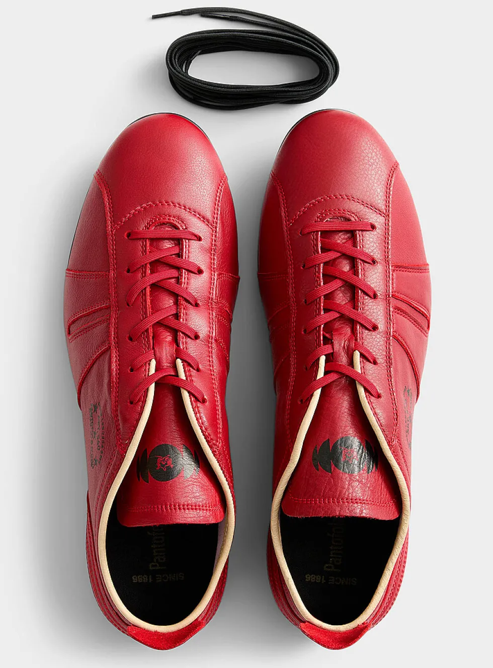 545 red sneakers