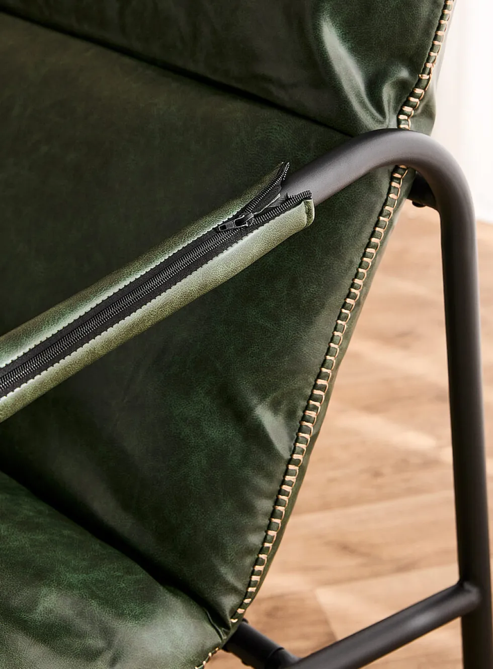 Accent stitching faux-leather lounge chair