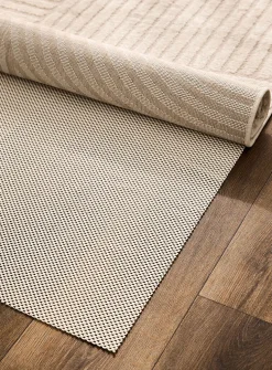 Adjustable anti-slip rug pad
