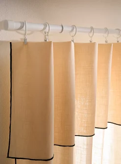 Adjustable white curtain rod