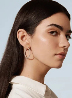 Amalgam large sterling silver hoops