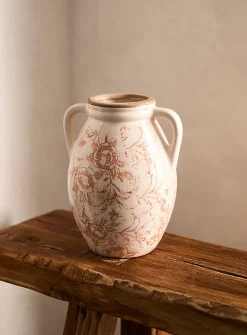 Ancient flowers handled vase