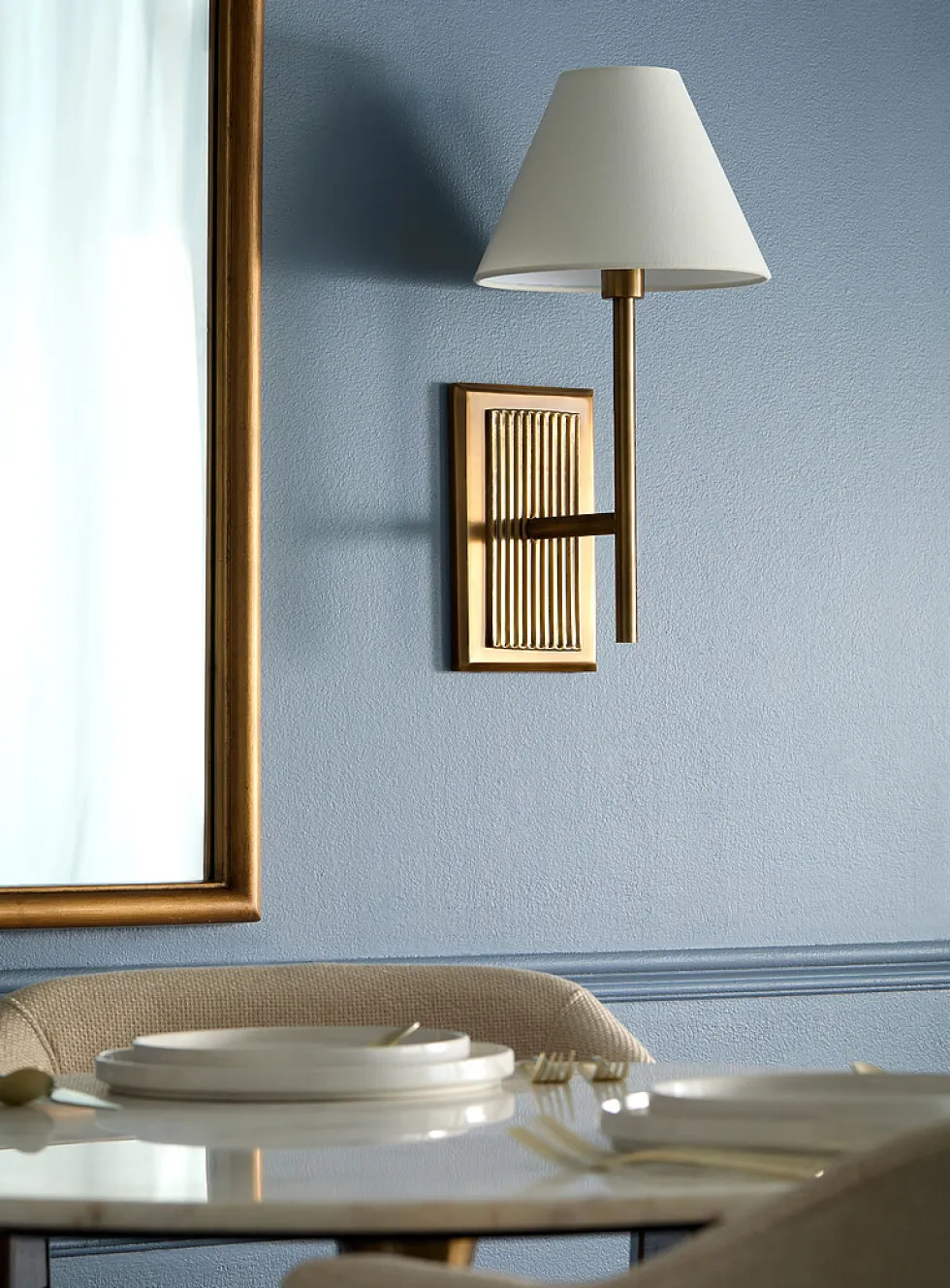 Antique brass finish fluted sconce