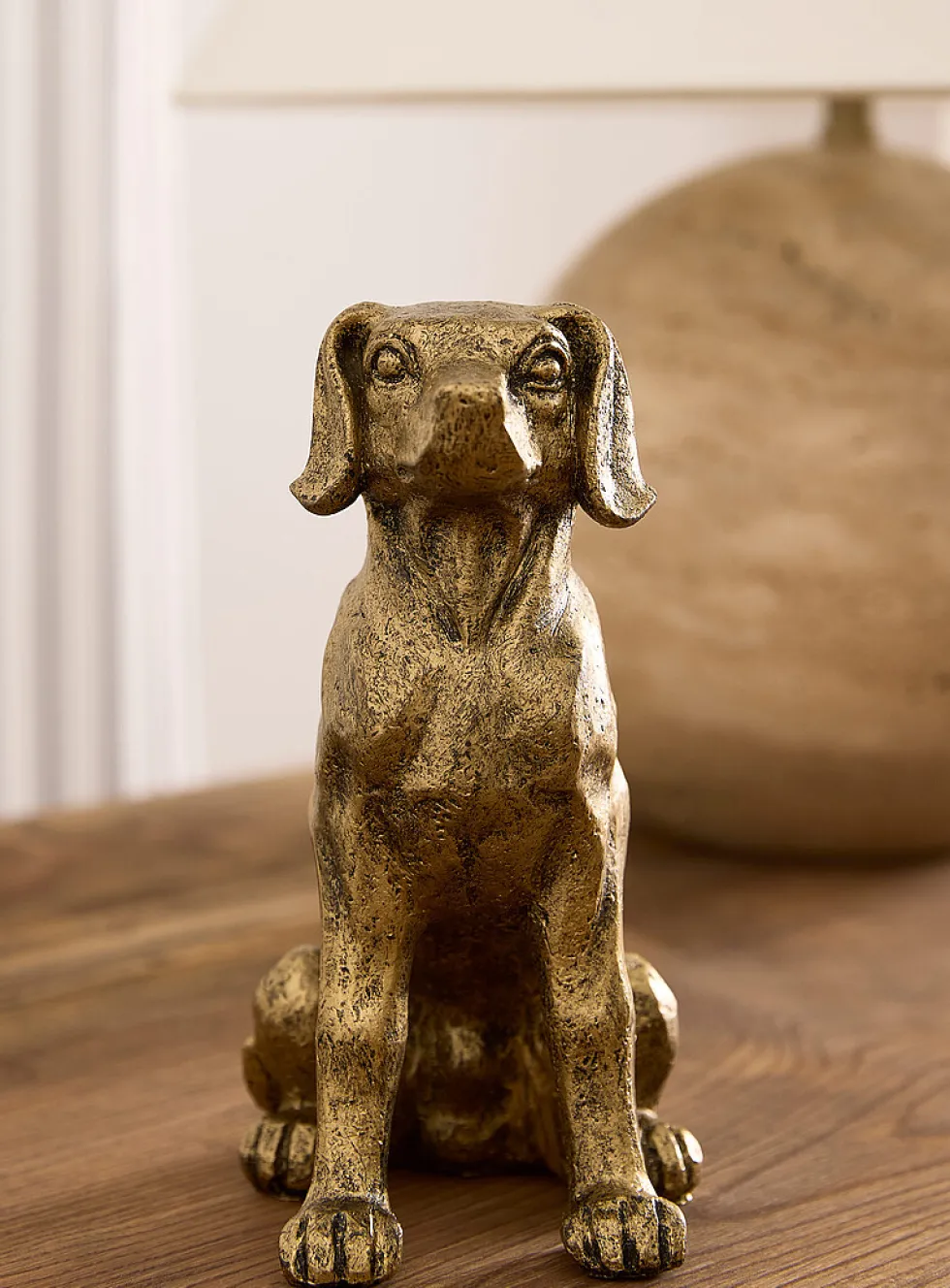Antique-style golden dog bookend