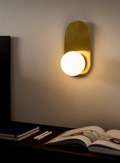 Arch brass wall sconce