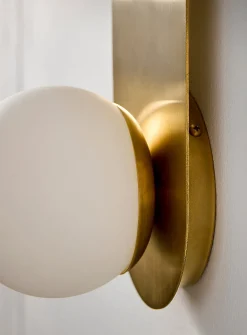 Arch brass wall sconce