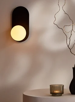 Arch wall sconce