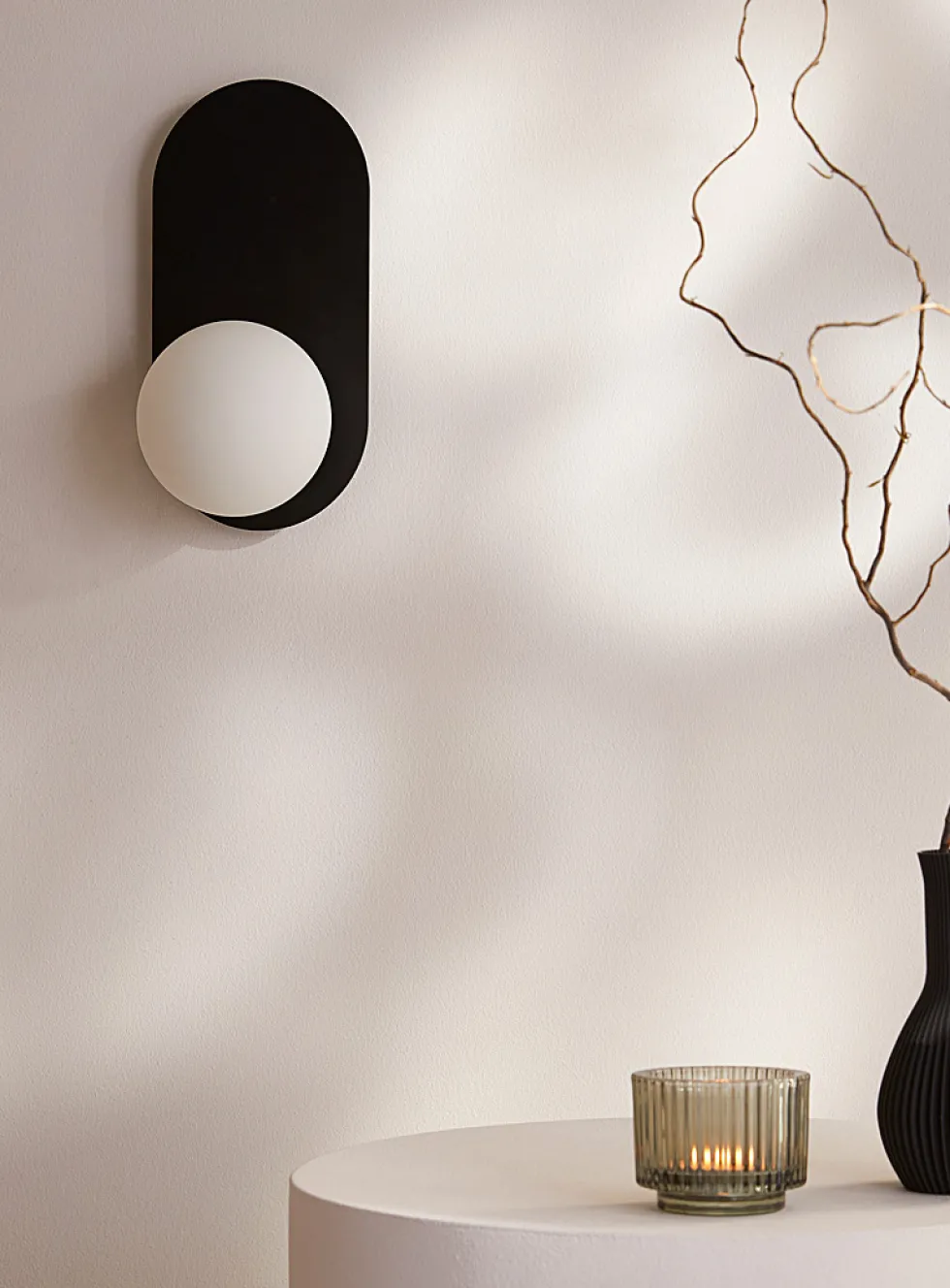 Arch wall sconce
