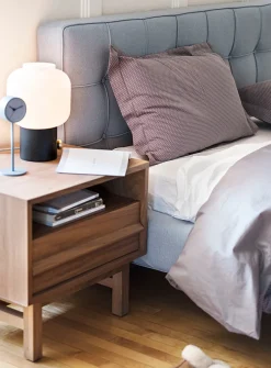 Architectural shelved walnut bedside table