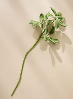 Artificial green leaves crocheted branch
