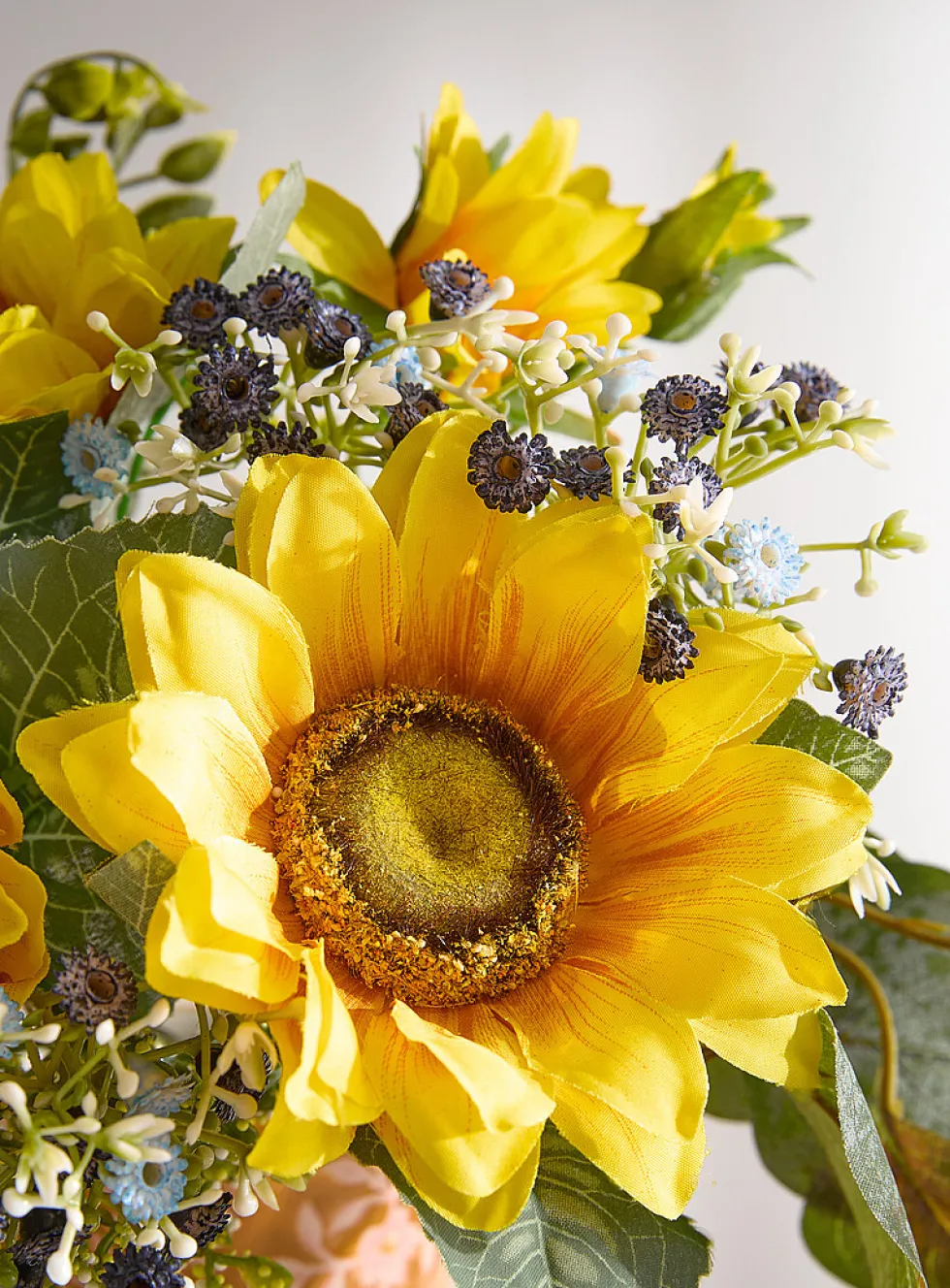 Artificial sunflower and baby's-breath bouquet