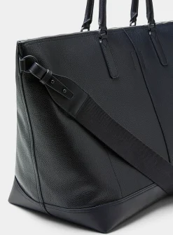 Asymmetric pocket travel bag