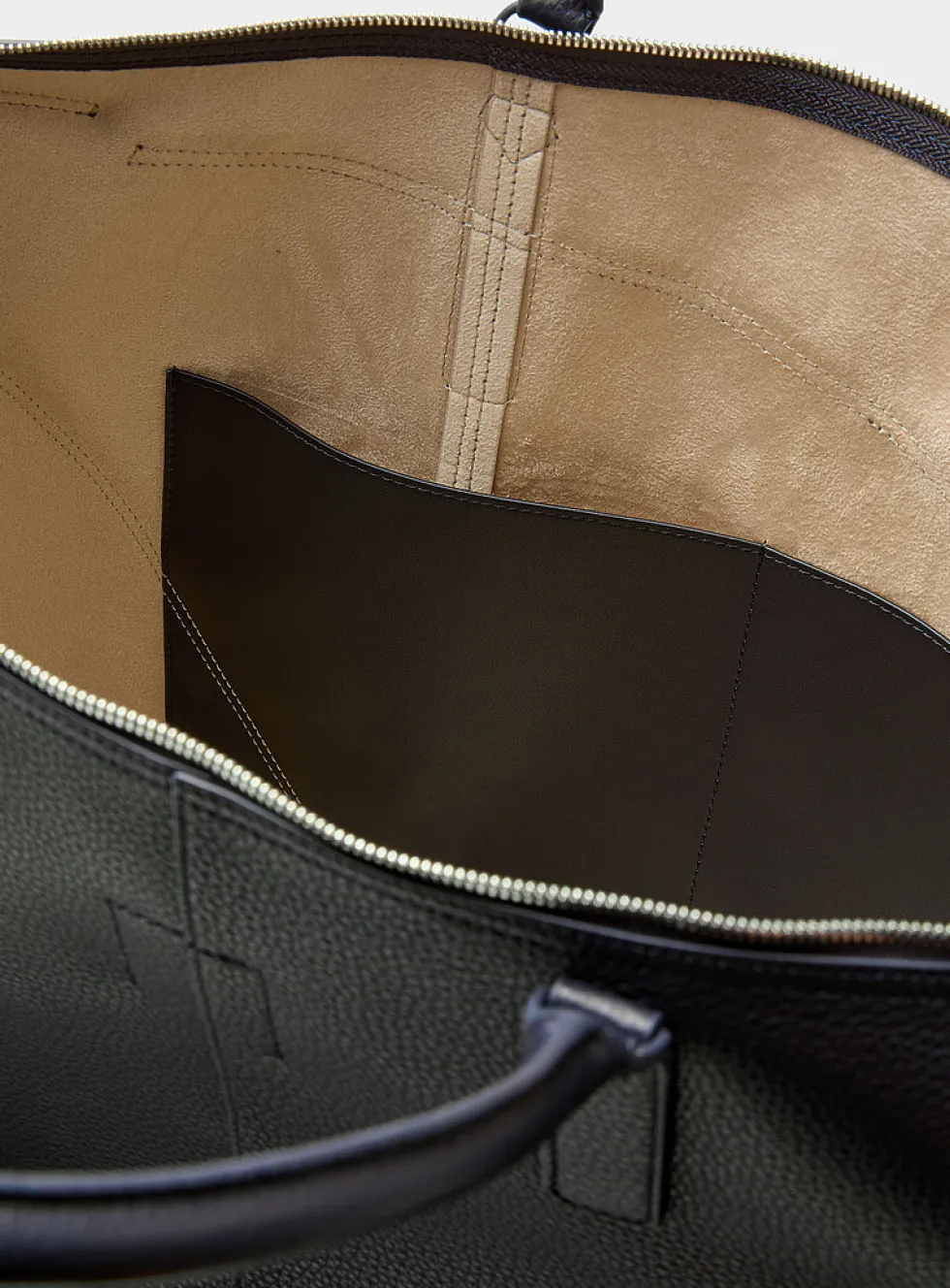 Asymmetric pocket travel bag