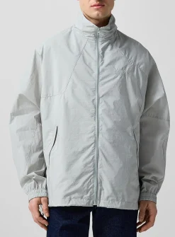 Asymmetrical seams nylon windbreaker