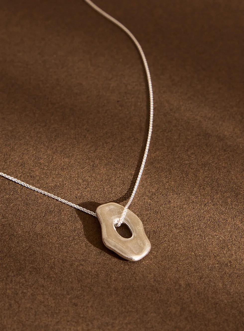 Asymmetrical solid silver pendant necklace