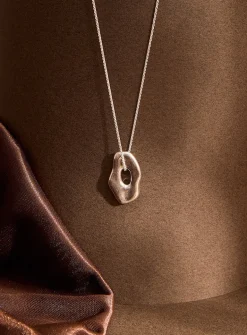 Asymmetrical solid silver pendant necklace