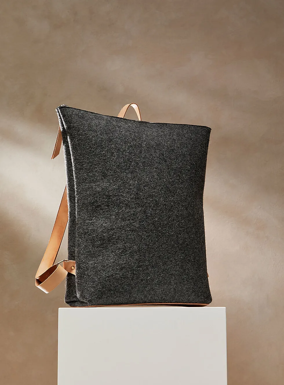 Auguste leather and wool felt backpack