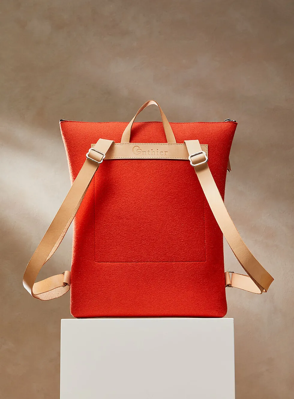 Auguste leather and wool felt backpack