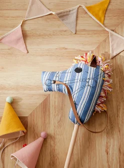 Baby horse on wooden stick