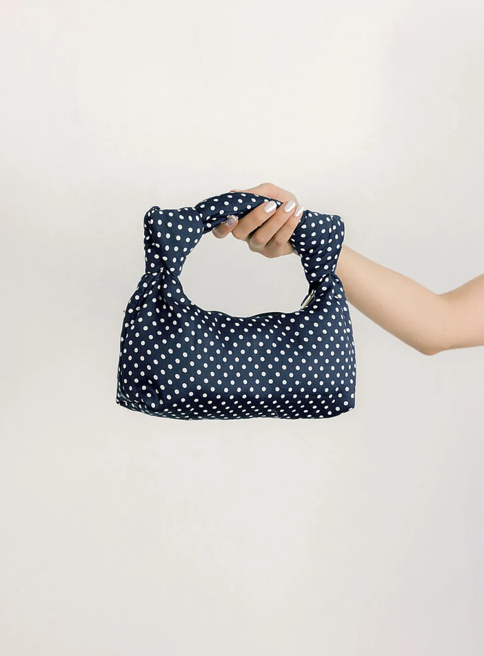 Bambi knotted handle evening bag