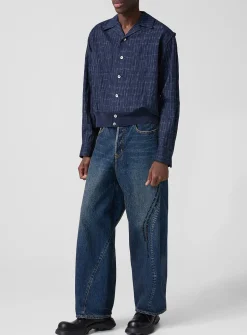 Beaded lyrics curved-seam jean