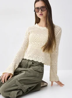 Bell-sleeve crocheted sweater