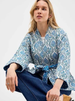 Belted reversible quilted jacket