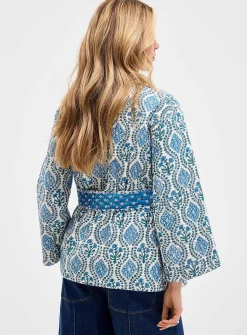 Belted reversible quilted jacket