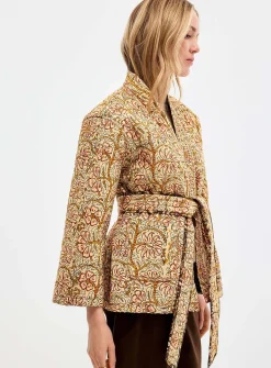 Belted reversible quilted jacket