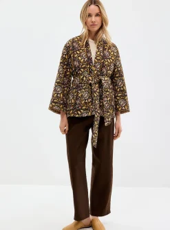 Belted reversible quilted jacket