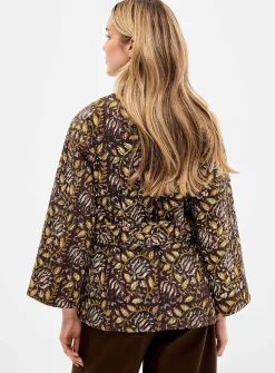 Belted reversible quilted jacket