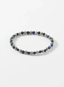 Black bead and grooved cross bracelet