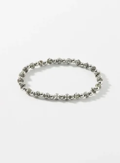 Black bead and grooved cross bracelet