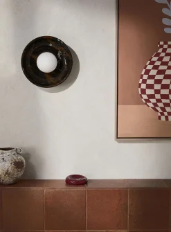 Black marble and opal glass donut wall sconce