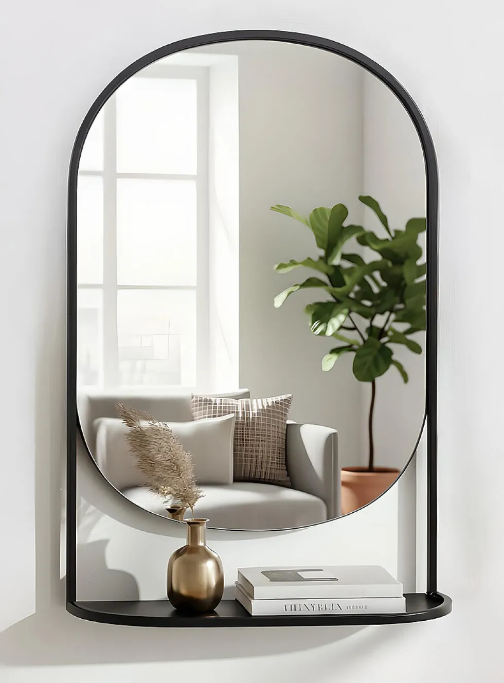 Black metal arched mirror with shelf
