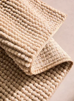 Bleached chenille bath mat