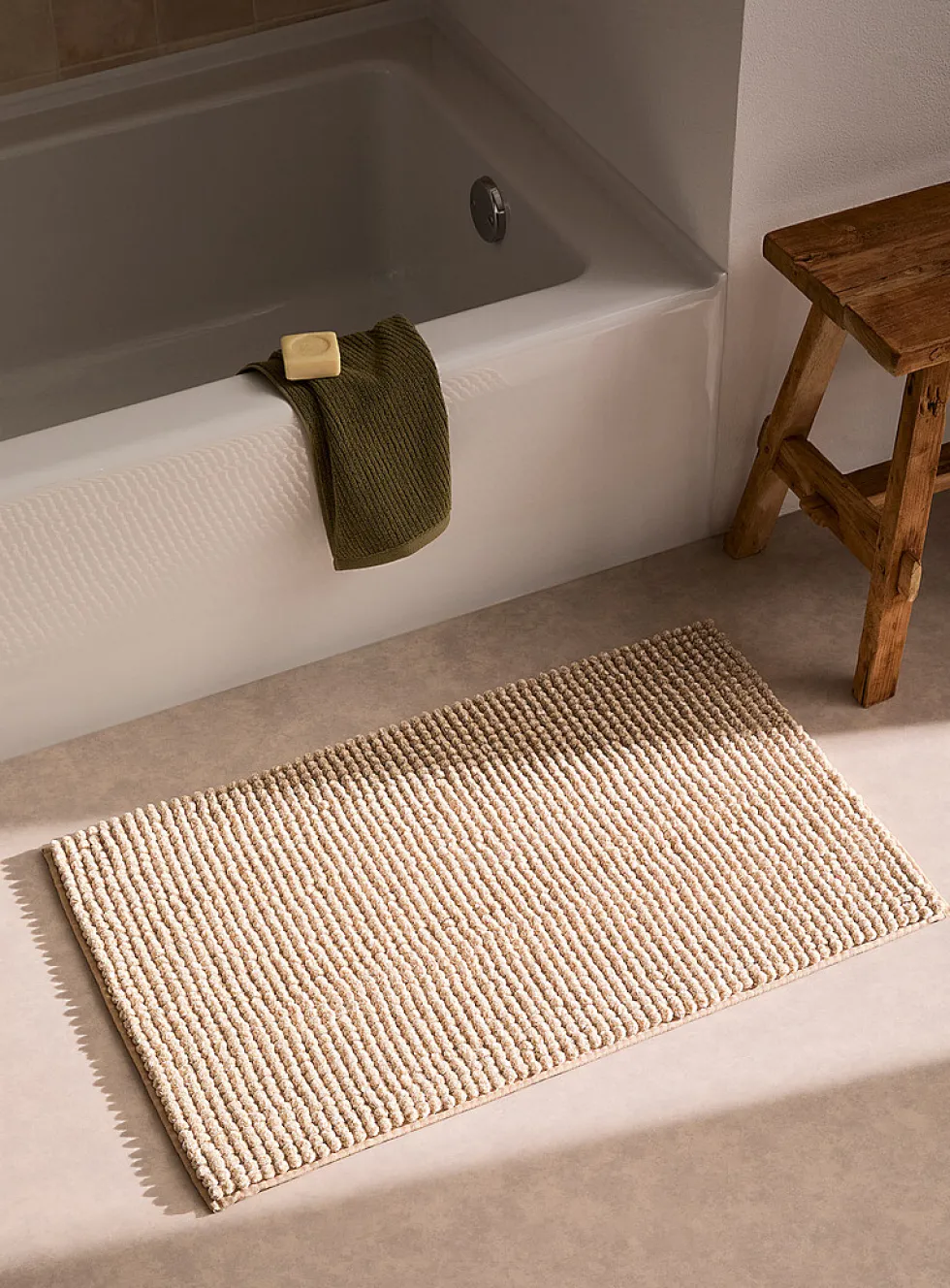 Bleached chenille bath mat