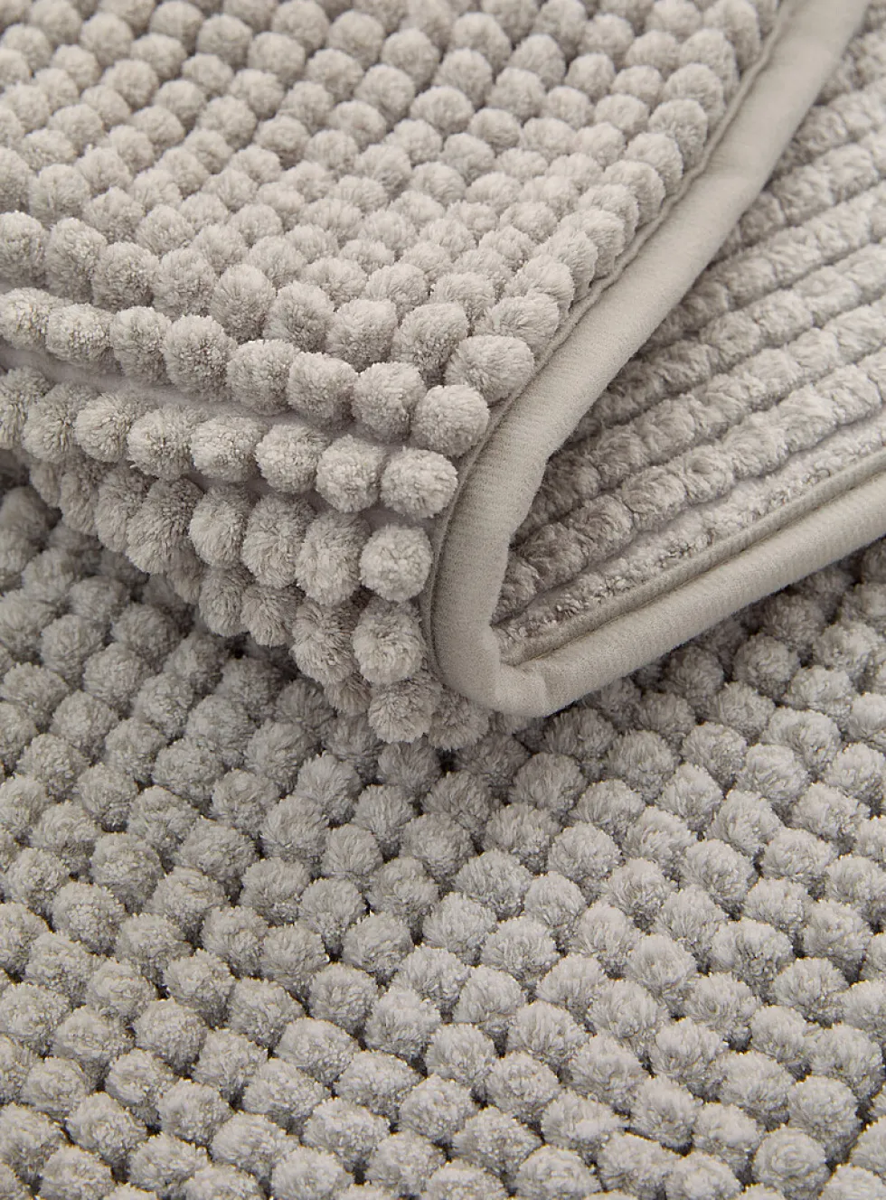 Bleached chenille bath mat