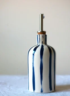 Blue striped oil bottle