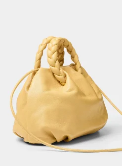 Bombon braided handles yellow leather bag