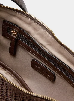 Braided straw rounded crossbody bag