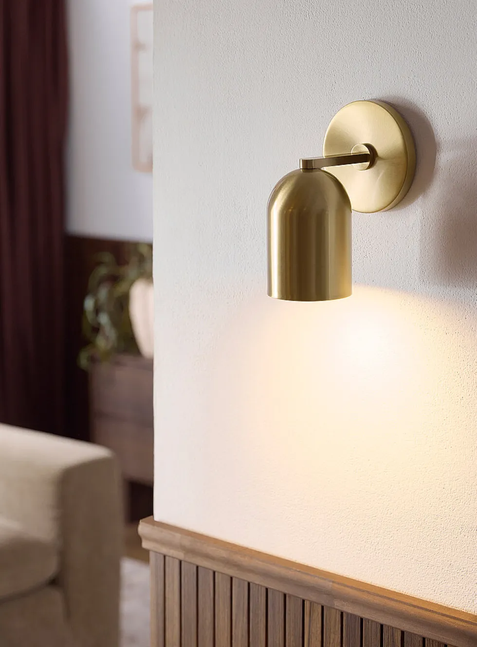 Brass finish domed wall sconce