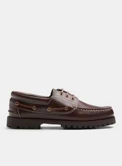 Brown leather notched boat shoes