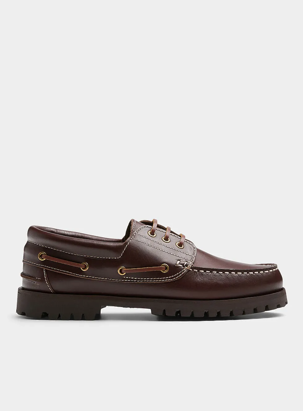 Brown leather notched boat shoes