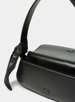 Buckled leather baguette bag