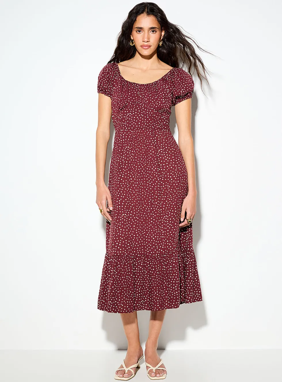 Bustier-style polka-dotted brown dress