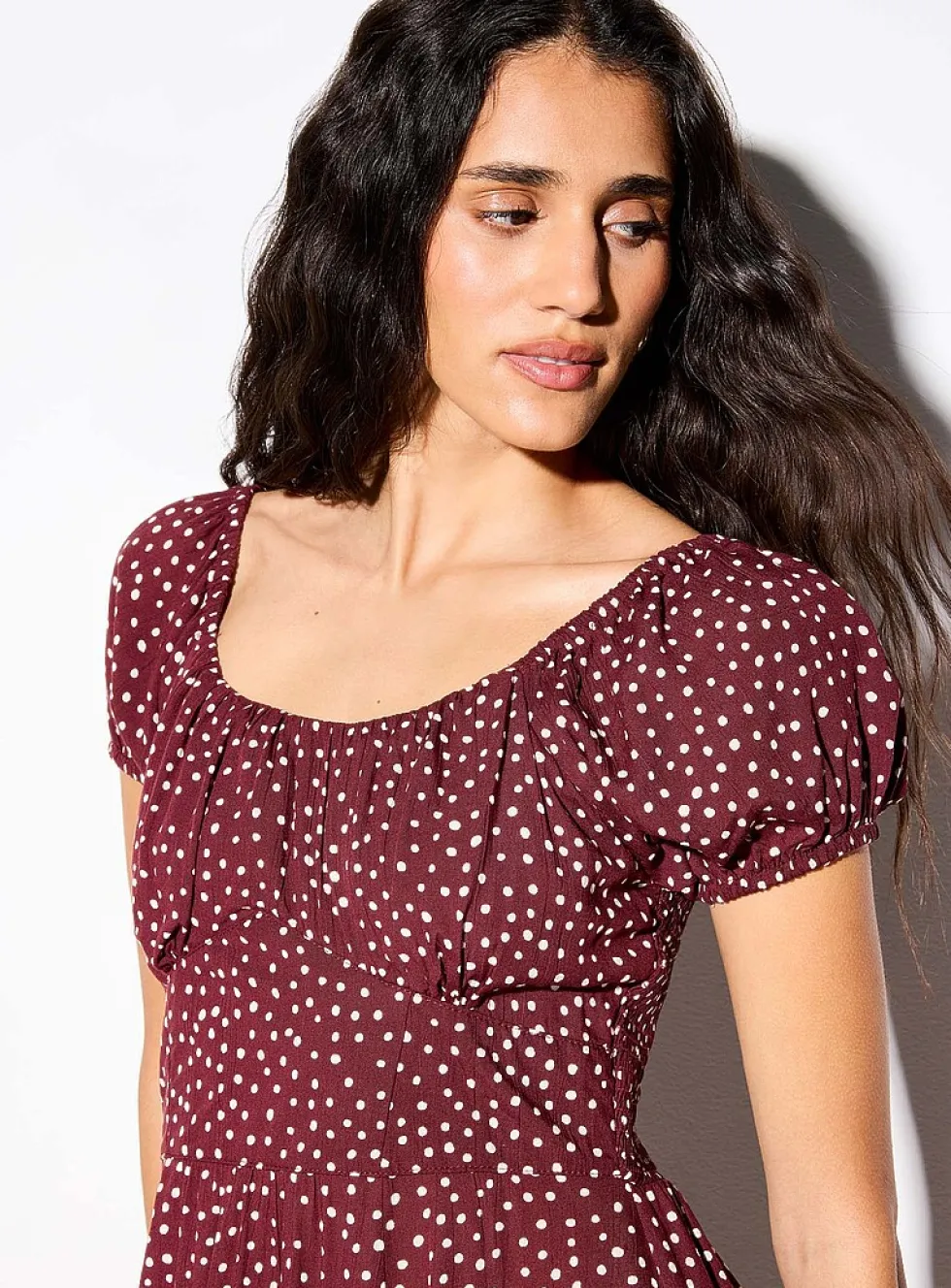 Bustier-style polka-dotted brown dress