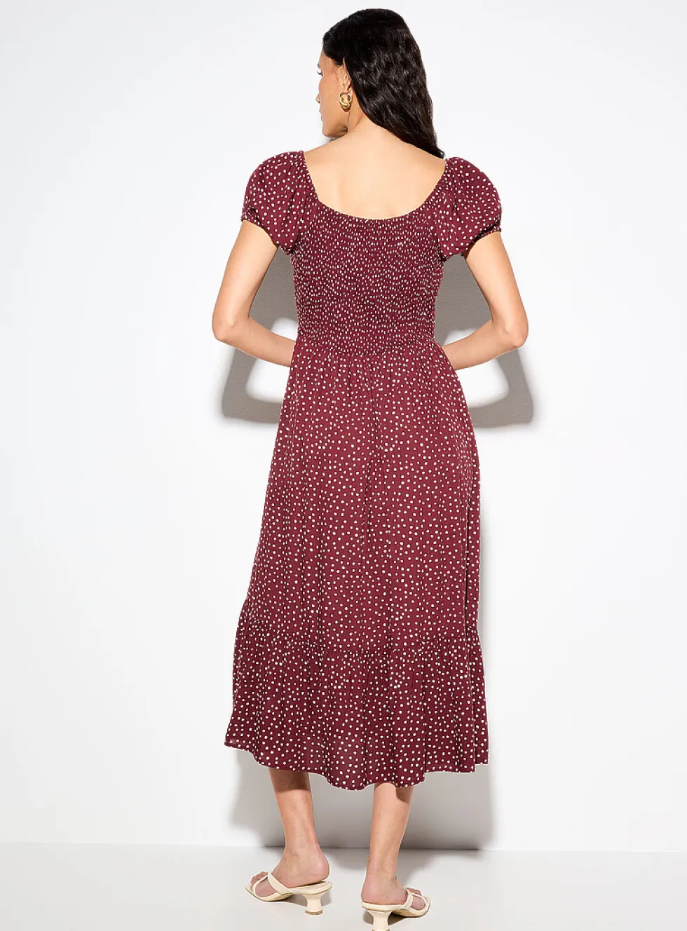 Bustier-style polka-dotted brown dress