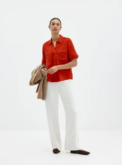 Buttoned-sleeve silk shirt